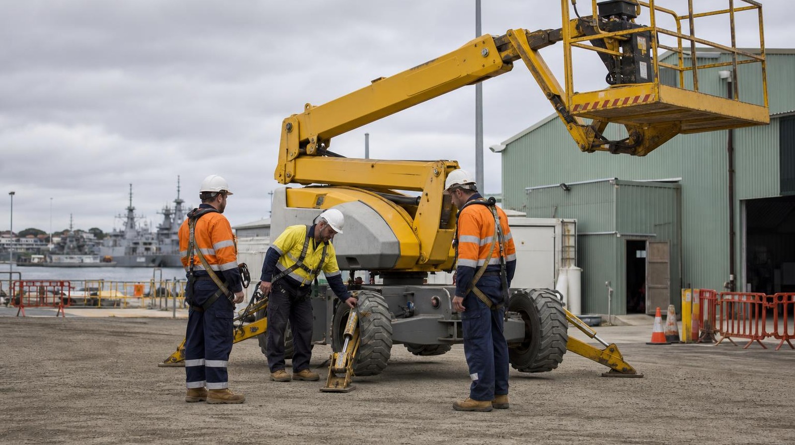 High risk work licence Perth students checking a boom EWP during pre-start training at Naval Base.