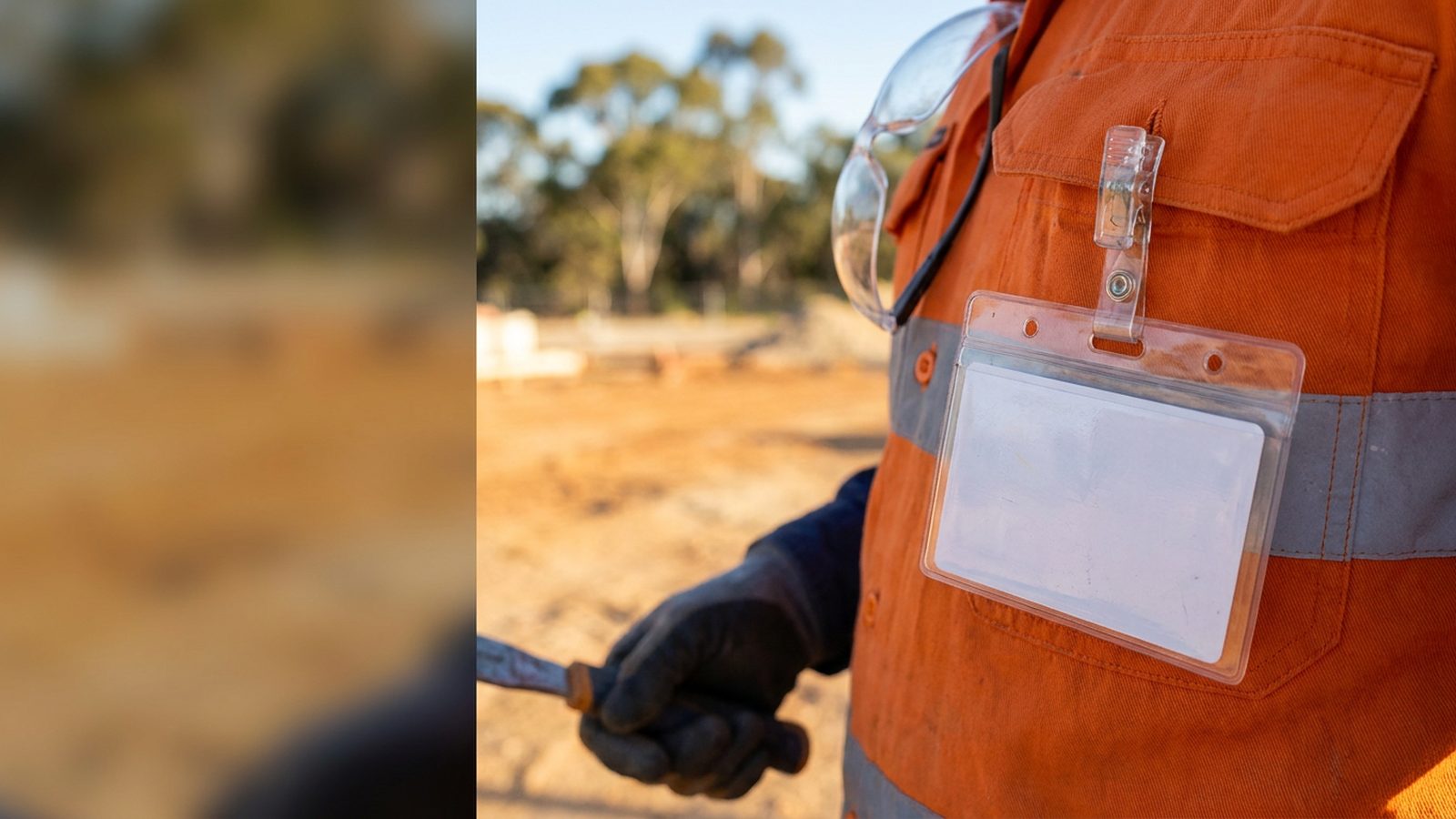 White card in a lanyard pouch on a Perth construction worker.