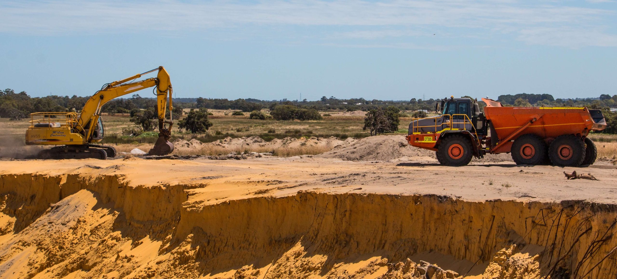 Mobile plant operator training on an excavator at an industrial site